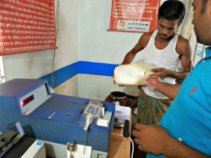 A digital fat testing machine is used to determine the fat content in the milk.