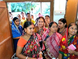 Members of the community gather at a milk collection point in rural Bangladesh.