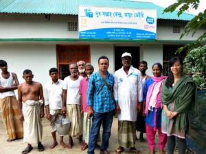 The author, IMM Fellow Jenn Wong (far right), in front of a milk collection point with CARE employees and locals, in a remote village outside Bogra, Bangladesh.