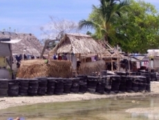 KIRIBATI Climate change Candy for tire scheme levees Sep30