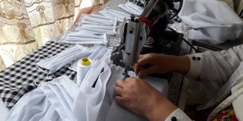 Istoray sews face masks to meet the growing demand in her community in Baghlan, Afghanistan, during the COVID-19 pandemic. Photo credit: AKFC