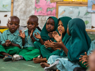 Caption: Children sing and clap during the Kindergarten One class at Ummul Qura Primary School in Mbuwani, Kwale County, Kenya.

Location: Mbuwani Village, Kwale County, Kenya

Project: SESEA

Institution: AKF