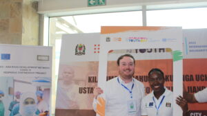 Two smiling young people take a selfie on a sunny day,