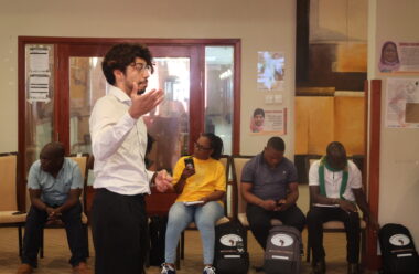 Muhammad delivering a workshop centered around peer-to-peer exchange networking at the event.