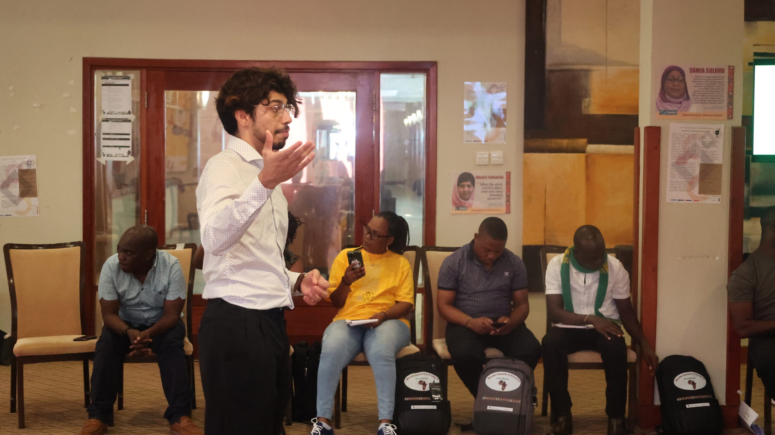 Muhammad delivering a workshop centered around peer-to-peer exchange networking at the event.