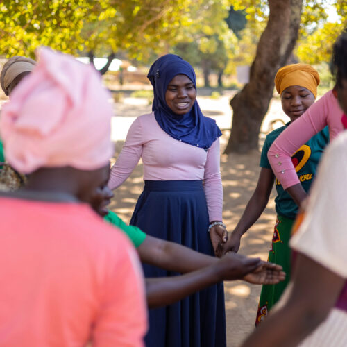 Aga Khan-Awa Amine-11 Caption: Awa Amine, Participant, Girls' Safe Space. Girls dance and play a game where one of them is pregnant.
Location: Nacaca Village, Montepuez
Counrty: Mozambique
Project : SPARC
Institution: Aga Khan Foundation